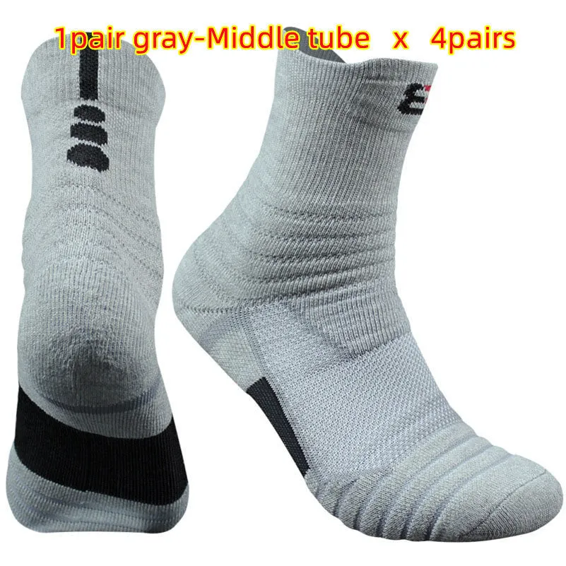 Three pairs of plain colour cotton blend socks in black, white, and grey