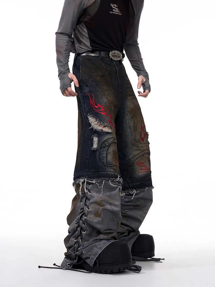Men's retro denim jeans with detachable trouser legs in a wide-leg, loose fit
