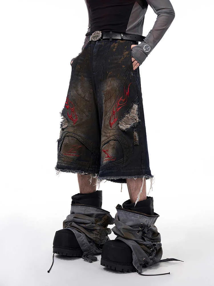Men's retro denim jeans with detachable trouser legs in a wide-leg, loose fit