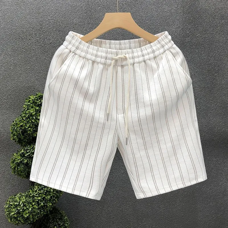 Men's black and white striped fleece-lined casual shorts with an elastic waistband
