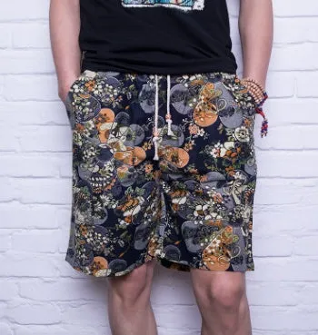 Men's linen beach shorts in print pattern with elastic waist on a neutral background