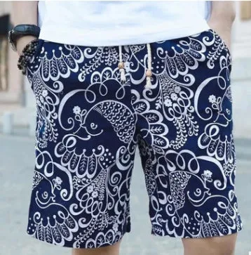 Men's linen beach shorts in print pattern with elastic waist on a neutral background