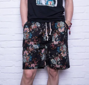 Men's linen beach shorts in print pattern with elastic waist on a neutral background