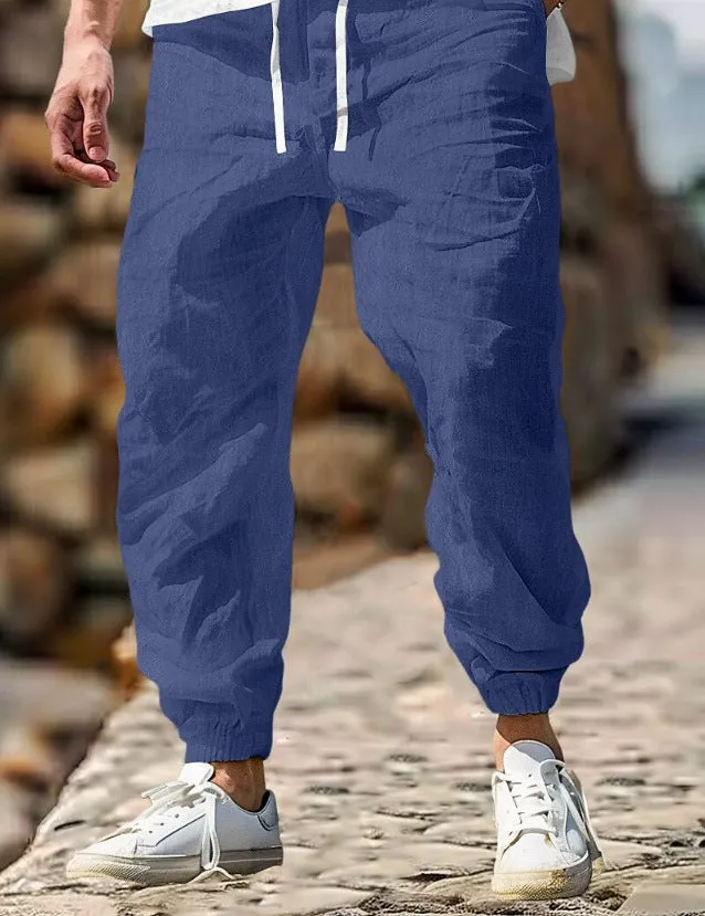 Men's straight-leg cotton trousers with elastic waist in apricot colour on a hanger