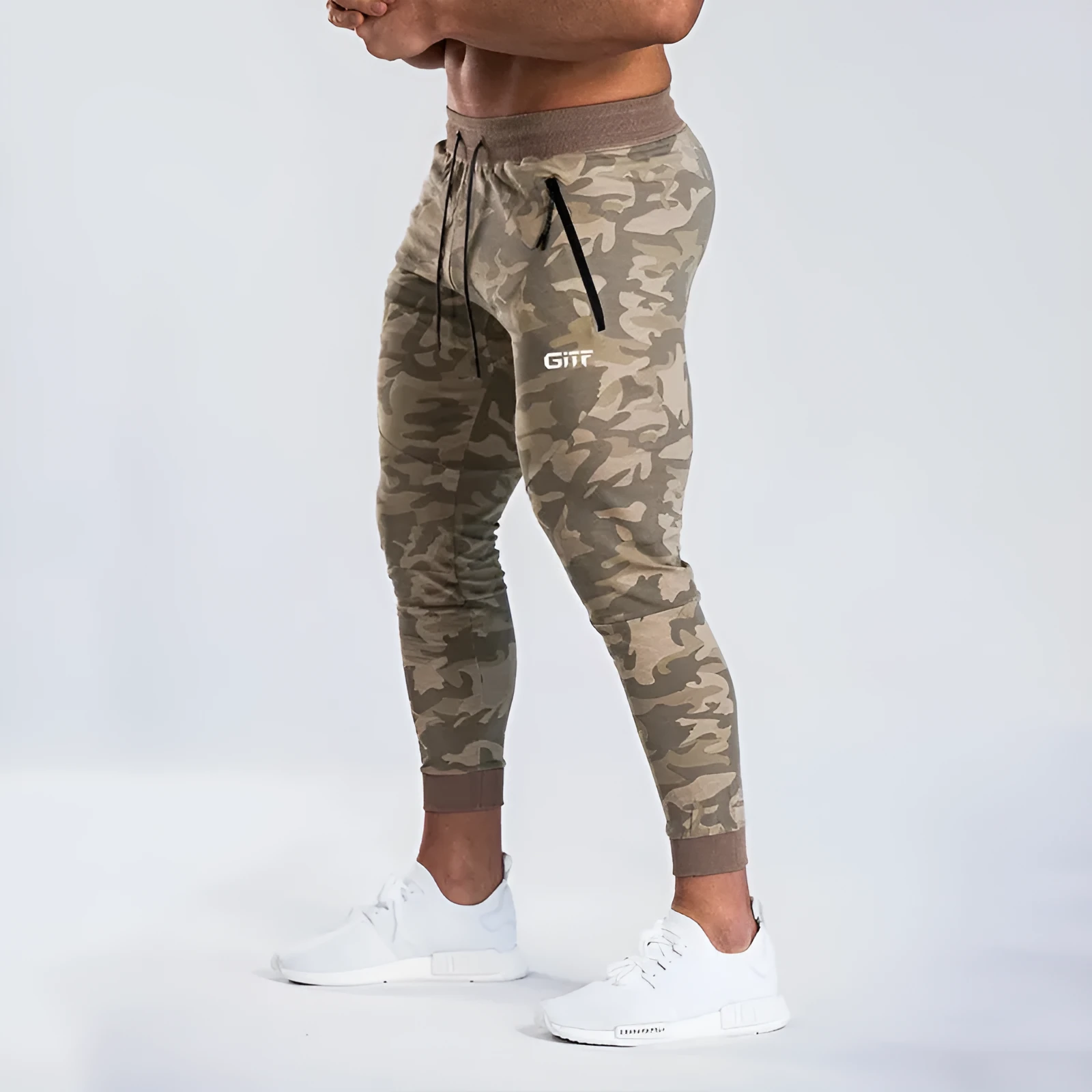 Men's camouflage quick dry jogging trousers in slim fit style from front view on plain background