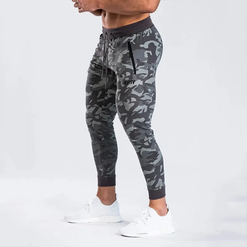 Men's camouflage quick dry jogging trousers in slim fit style from front view on plain background