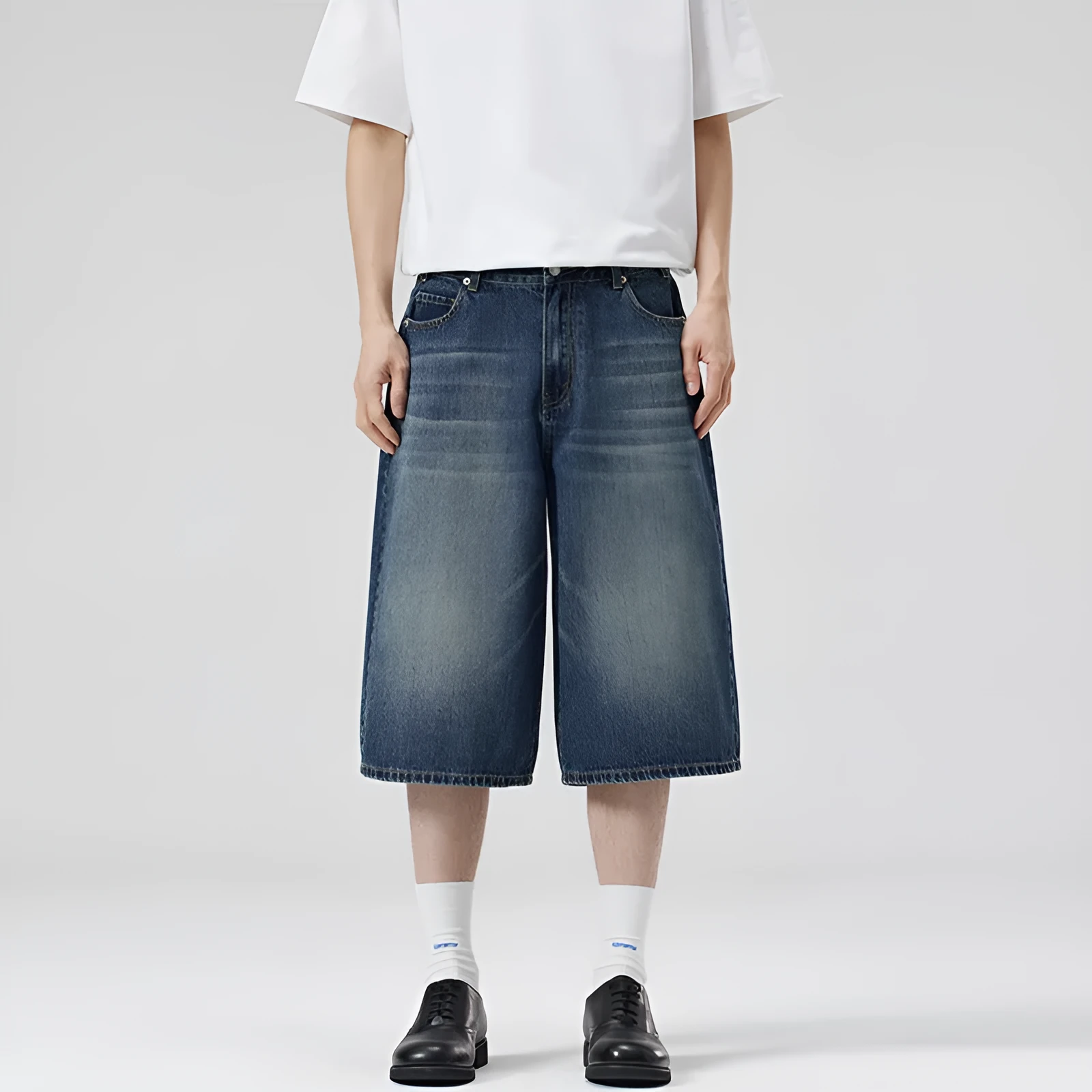 Men's straight-leg denim shorts in cropped length showing light blue colour option