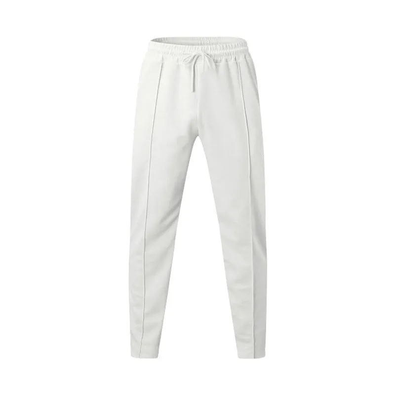 Men's loose straight drawstring trousers in waffle polyester fabric, shown in multiple colour options
