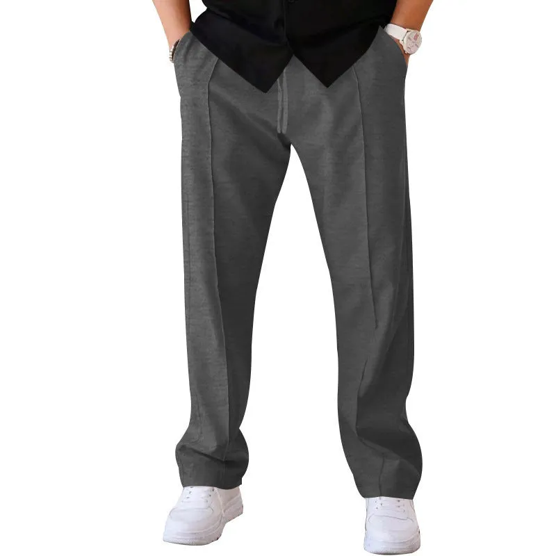 Men's loose straight drawstring trousers in waffle polyester fabric, shown in multiple colour options