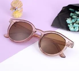 Unisex reading glasses with spring hinge temple in six colours including black, blue, brown, pink, red, and yellow