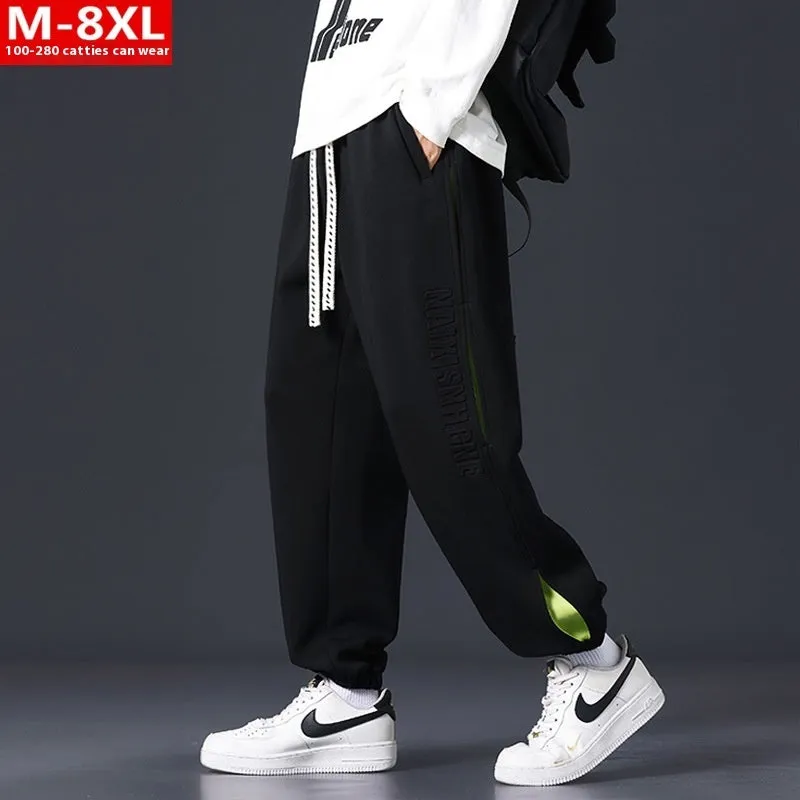 Men's loose cotton trousers with stitching detailing and ankle banding in grey green colour