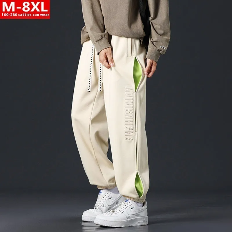 Men's loose cotton trousers with stitching detailing and ankle banding in grey green colour