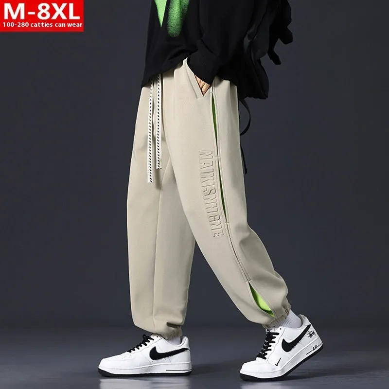 Men's loose cotton trousers with stitching detailing and ankle banding in grey green colour