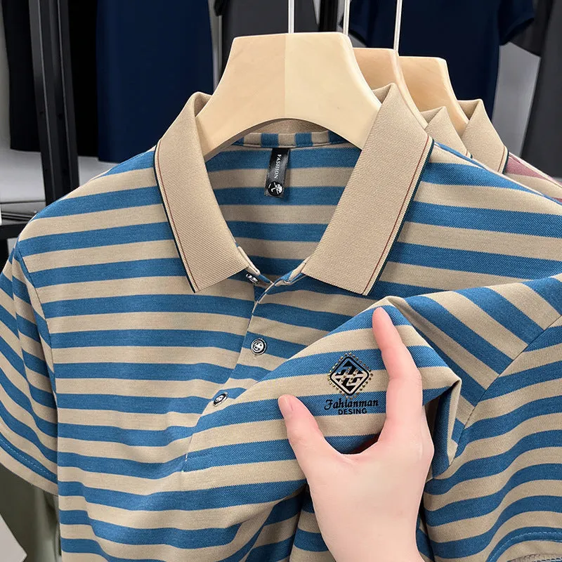 A man wearing a red striped casual short sleeve shirt with mosaic pattern detail.