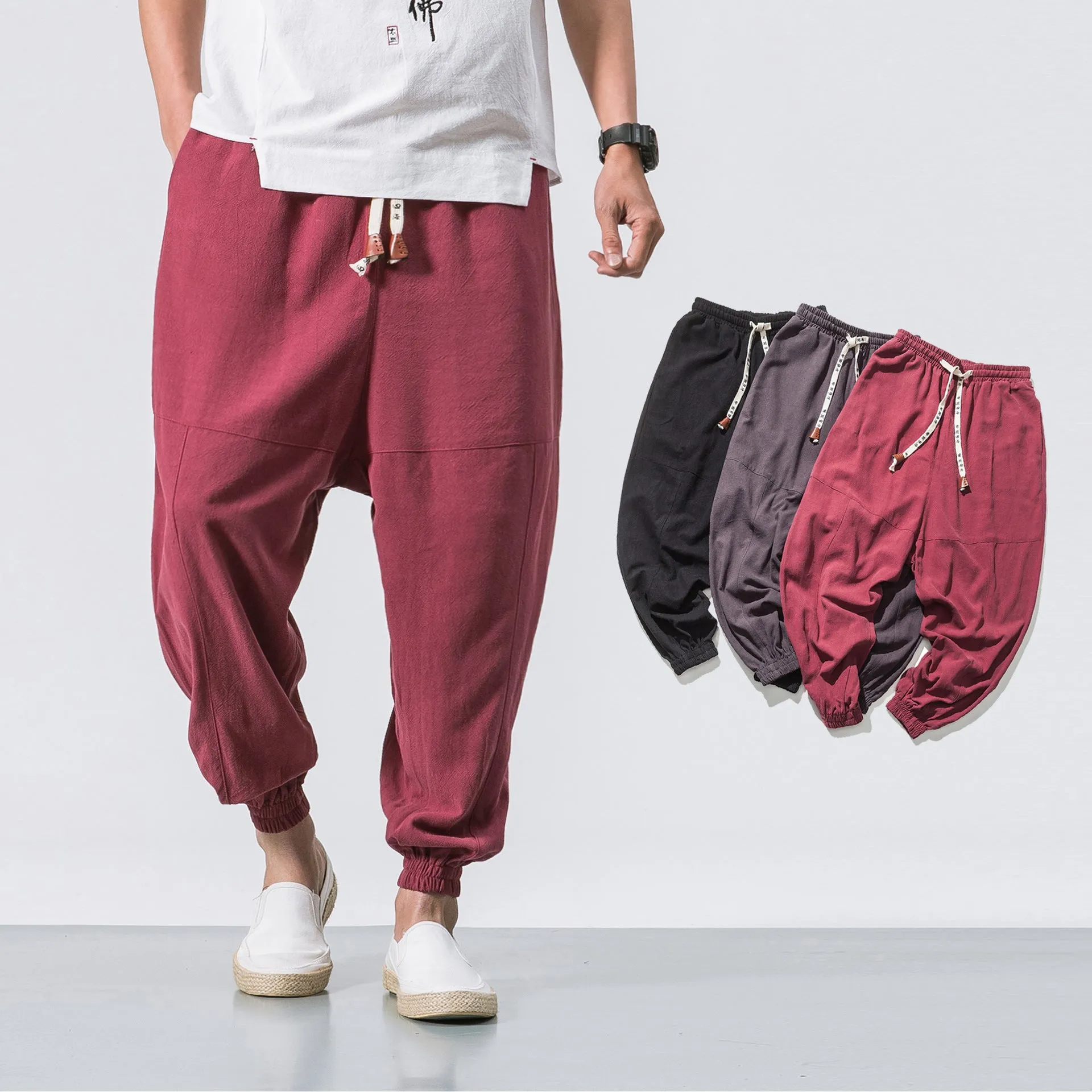 Men's black cotton hip hop streetwear joggers with drawstring waist and slant pockets