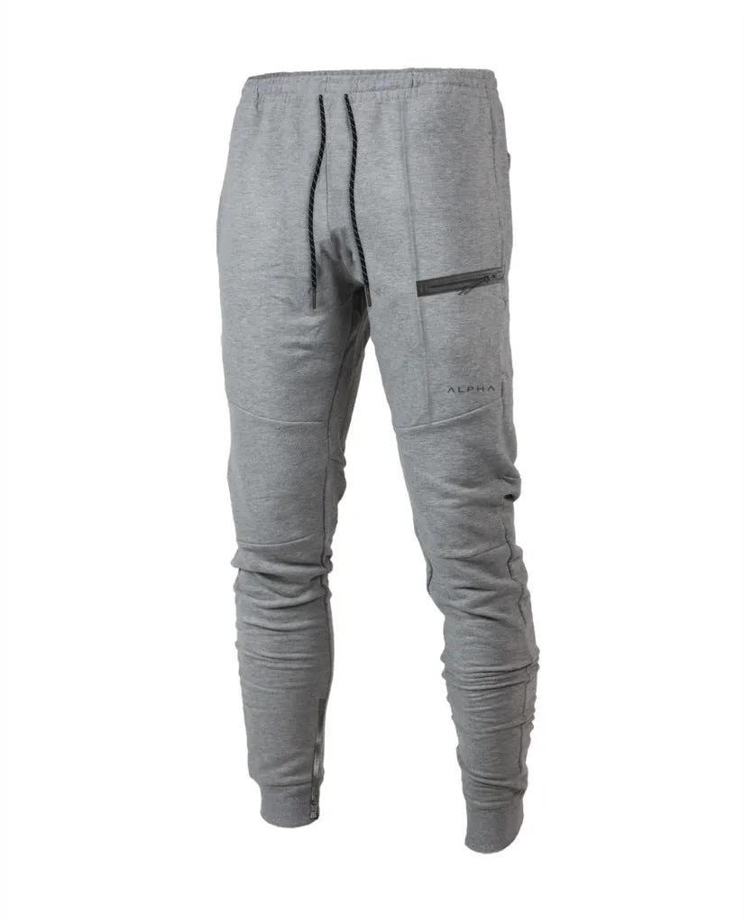 Men's black cotton joggers with elastic waist and velcro side pockets, loose fit, for sports and casual wear