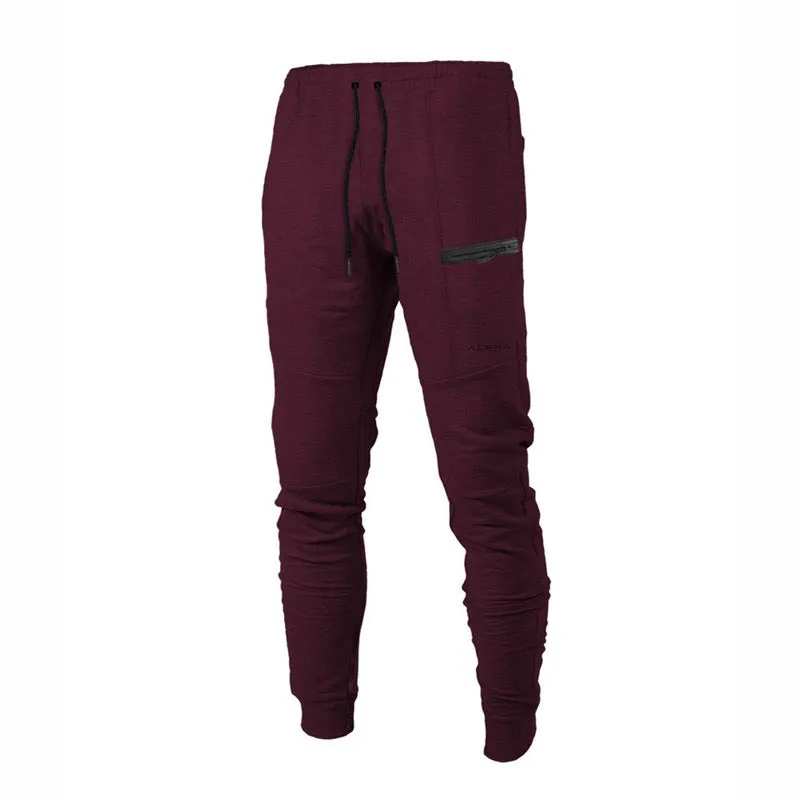 Men's black cotton joggers with elastic waist and velcro side pockets, loose fit, for sports and casual wear
