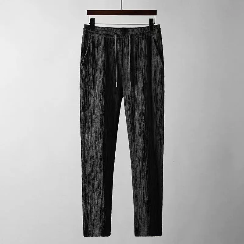 Leisure suit summer loose short sleeve top and drawstring trousers for men, polyester fabric, black and white option