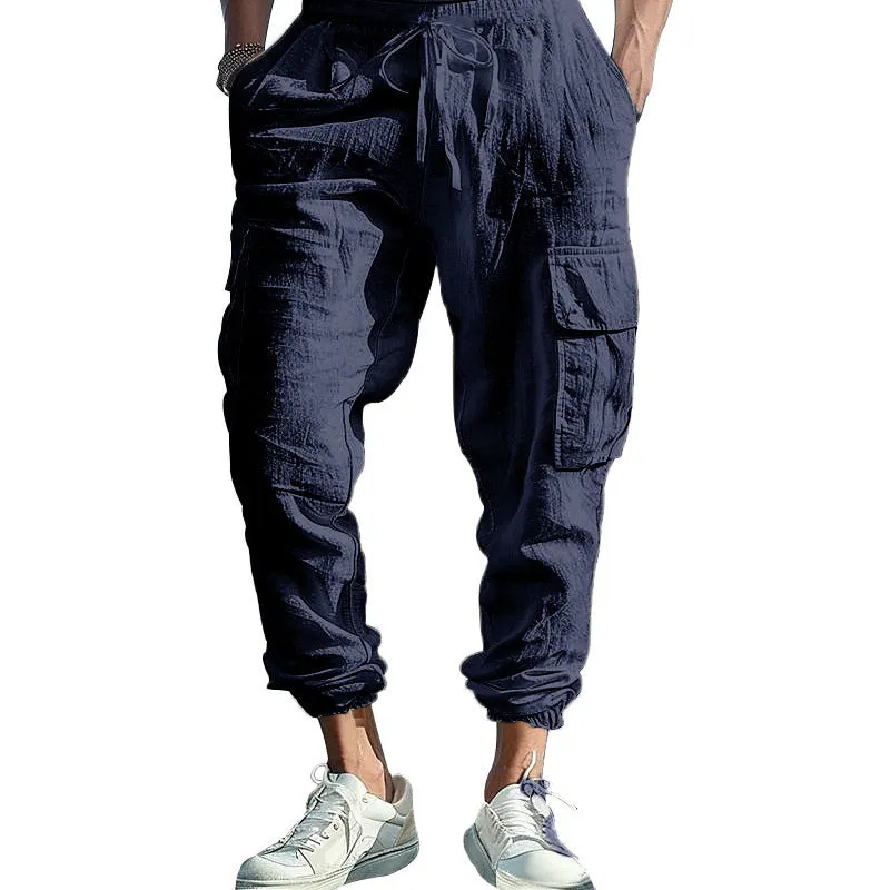 Men's casual linen trousers with ankle ties and multiple pockets in solid colour options