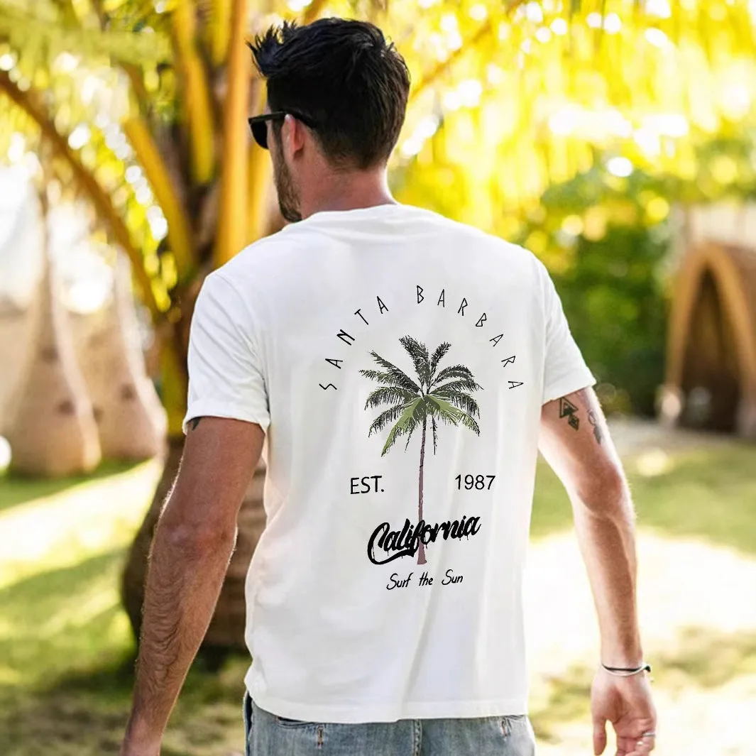Men's white pure cotton loose fit cartoon print short sleeve t-shirt with black contrast pattern, front view