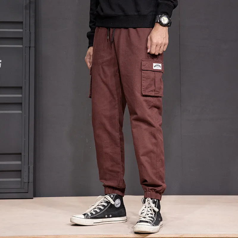 Men's cotton cargo pants in military green, cropped length, lace-up front closure, hip hop streetwear style