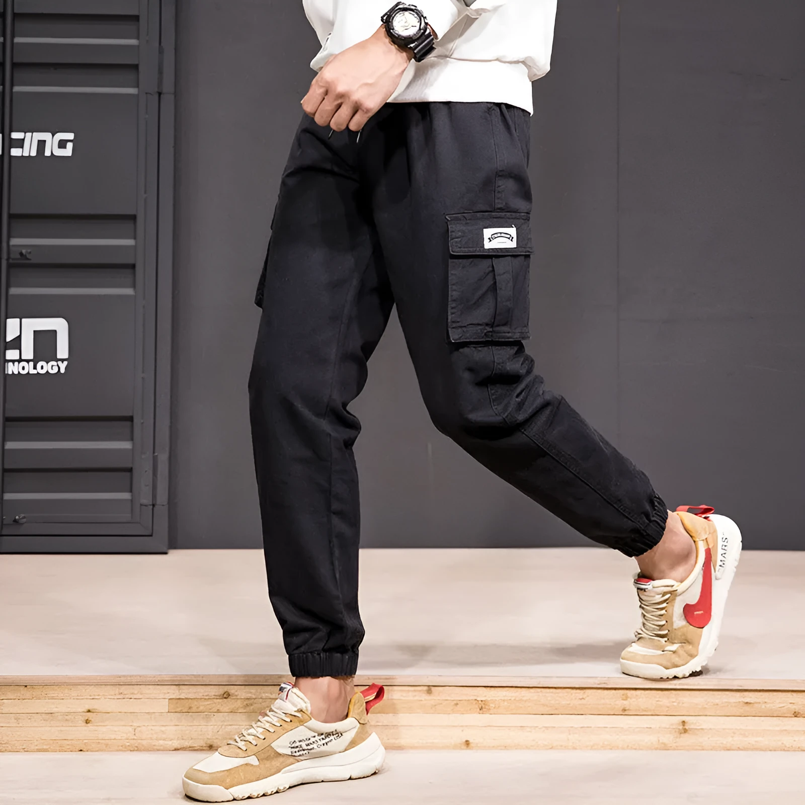 Men's cotton cargo pants in military green, cropped length, lace-up front closure, hip hop streetwear style