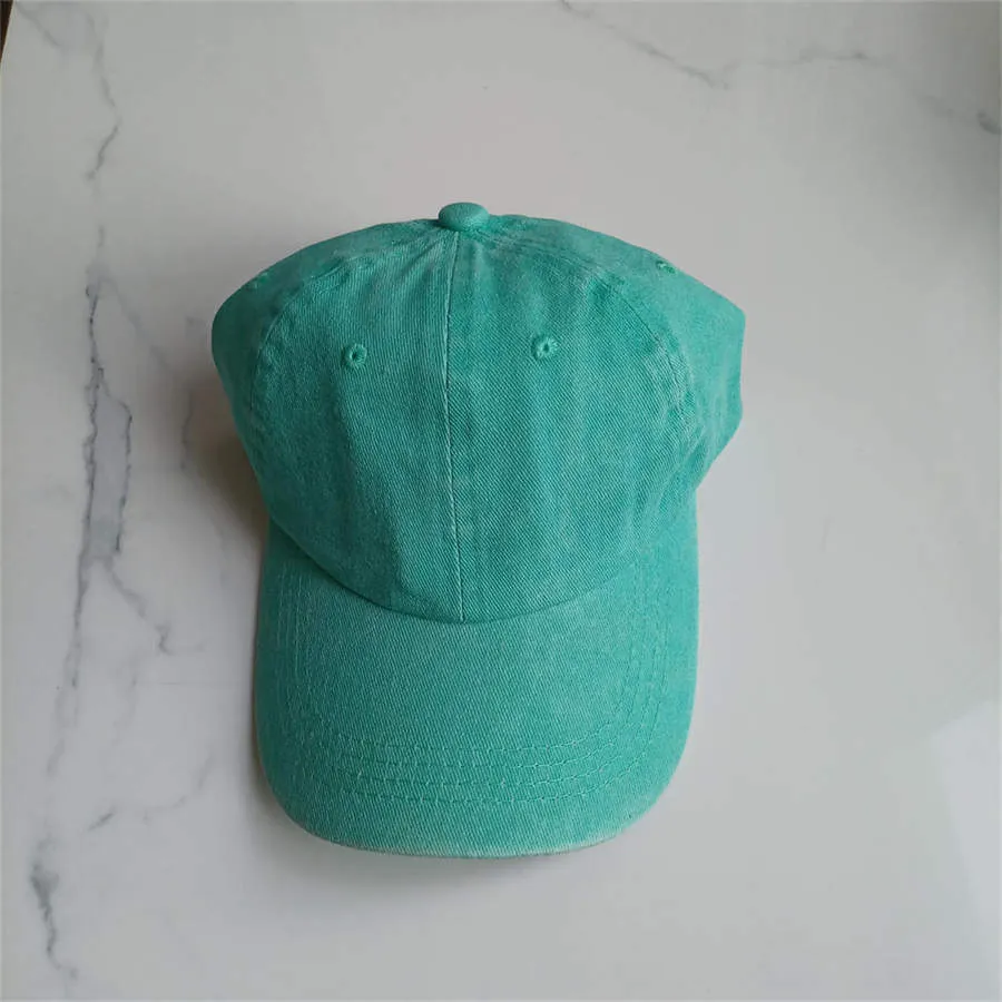 Retro washed cotton baseball cap in Army Green with dome crown and adjustable strap
