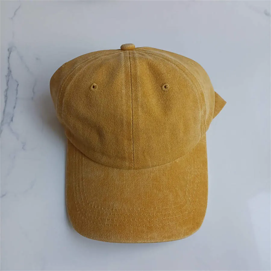 Retro washed cotton baseball cap in Army Green with dome crown and adjustable strap