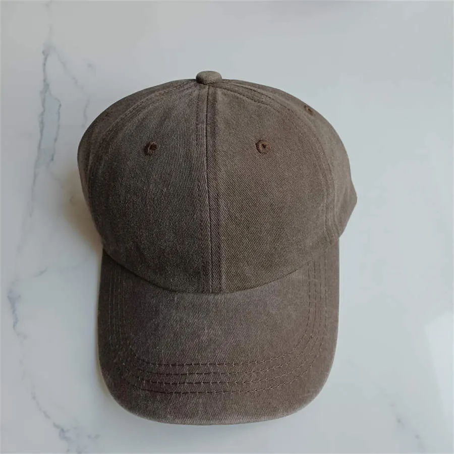 Retro washed cotton baseball cap in Army Green with dome crown and adjustable strap