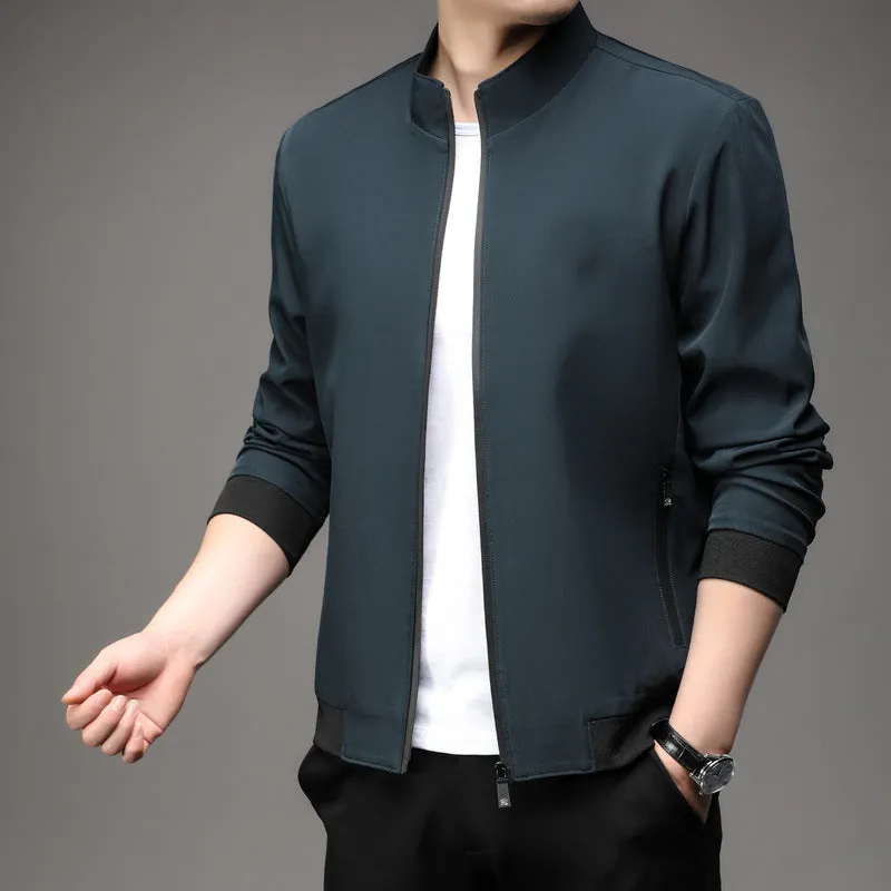 Man wearing a thin, loose lapel Korean-style casual jacket in a neutral colour.