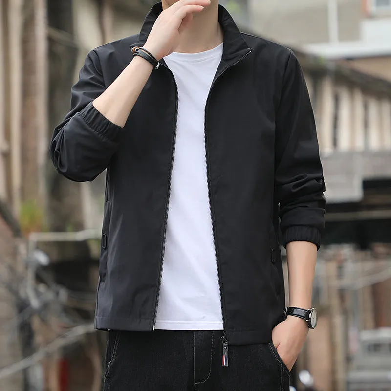 Man wearing a thin, loose lapel Korean-style casual jacket in a neutral colour.