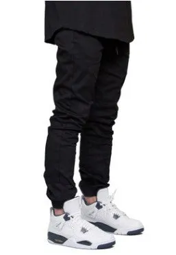 Men's casual stretch joggers in black with mid-waist drawstring closure and tight-fit leg