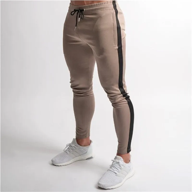 Sports cropped pants in polyester fibre, available in Khaki colour, showing cropped leg length and elastic waistband
