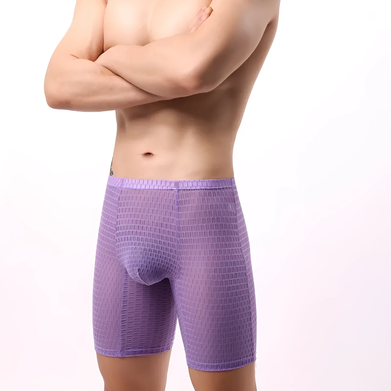 Men's transparent black lace boxer shorts with a lengthened design and mid waist.
