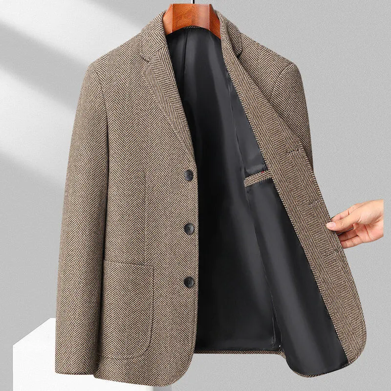 A man wearing a simple, loose-fit solid-colour woolen coat suitable for spring or autumn.
