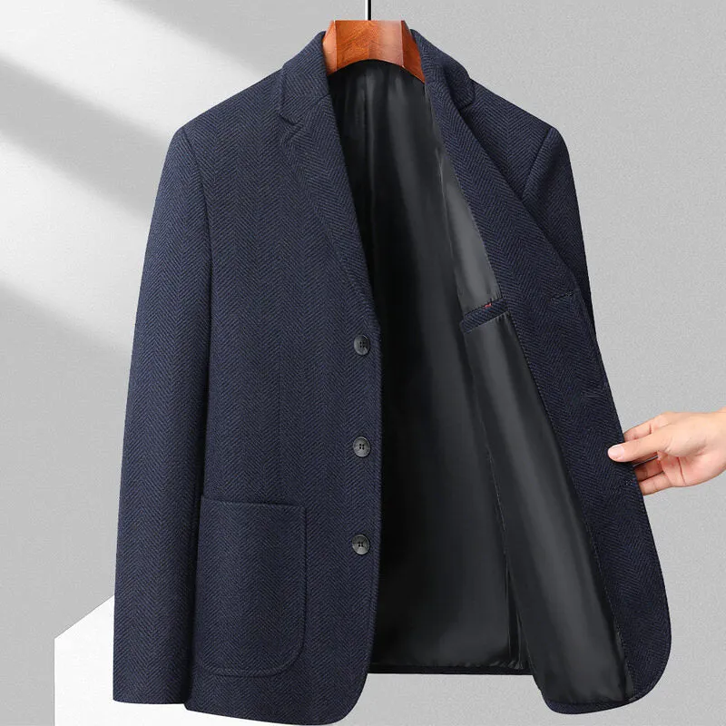 A man wearing a simple, loose-fit solid-colour woolen coat suitable for spring or autumn.