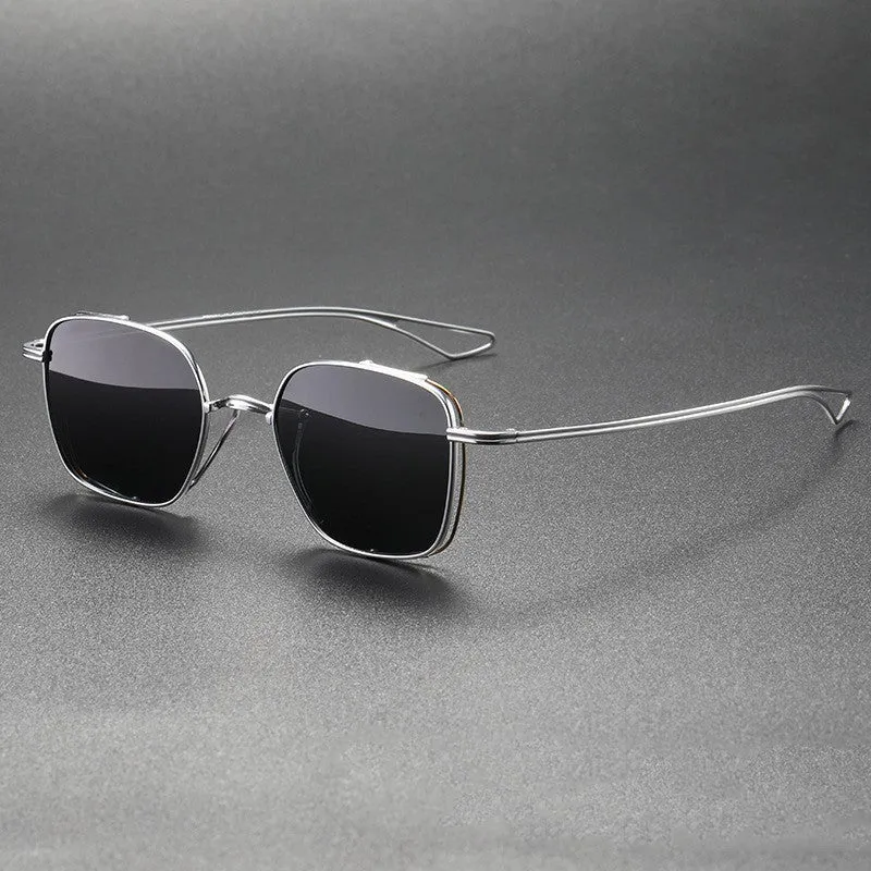 Polarized sunglasses with pure titanium frame in box style, gun mount colour with black and gray lenses