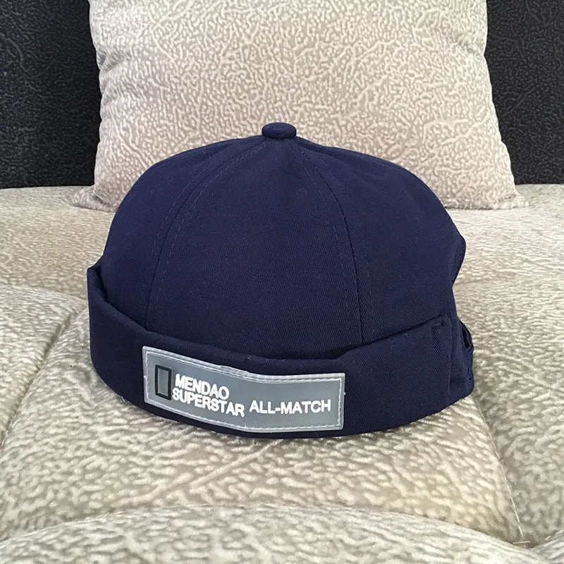 Cotton baseball cap with letter pattern and rivet details, adjustable no brim, seasonal wear