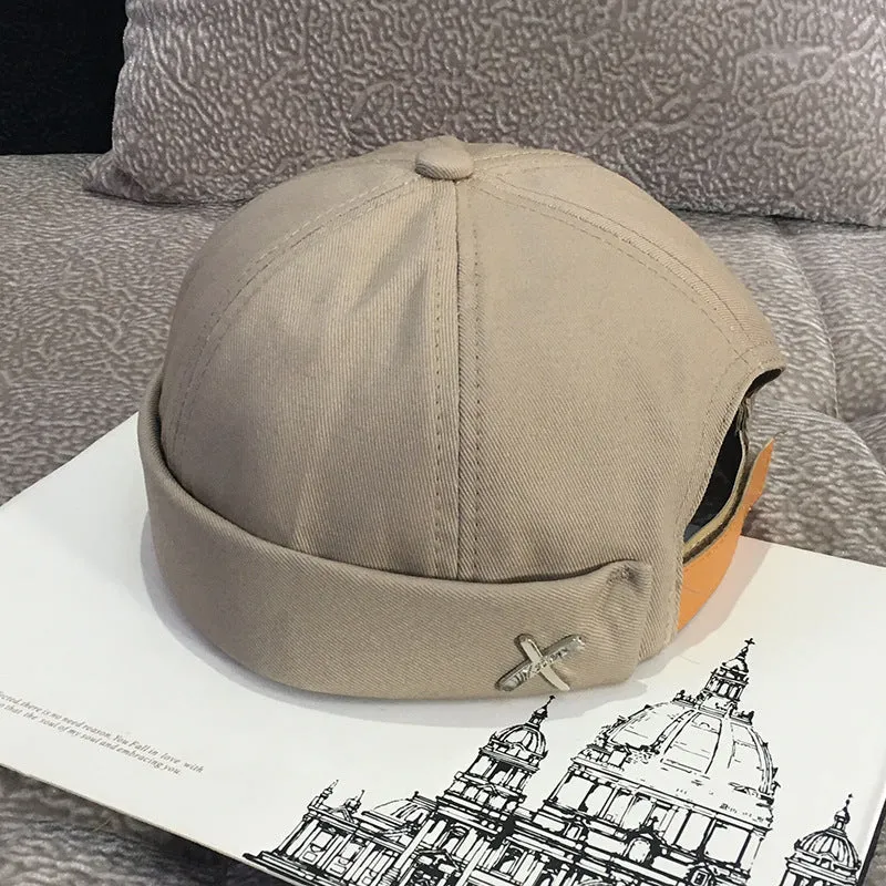 Cotton baseball cap with letter pattern and rivet details, adjustable no brim, seasonal wear