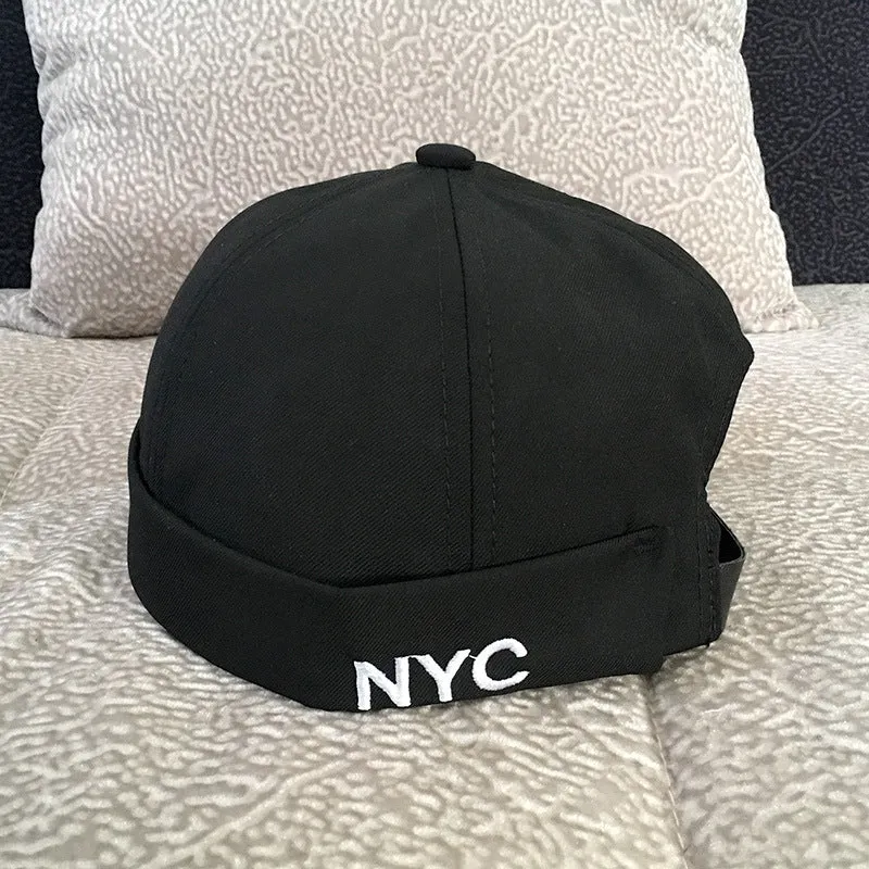 Cotton baseball cap with letter pattern and rivet details, adjustable no brim, seasonal wear