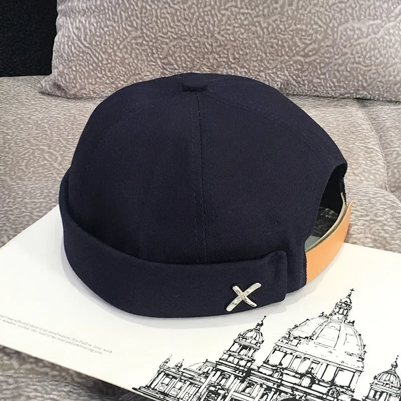 Cotton baseball cap with letter pattern and rivet details, adjustable no brim, seasonal wear