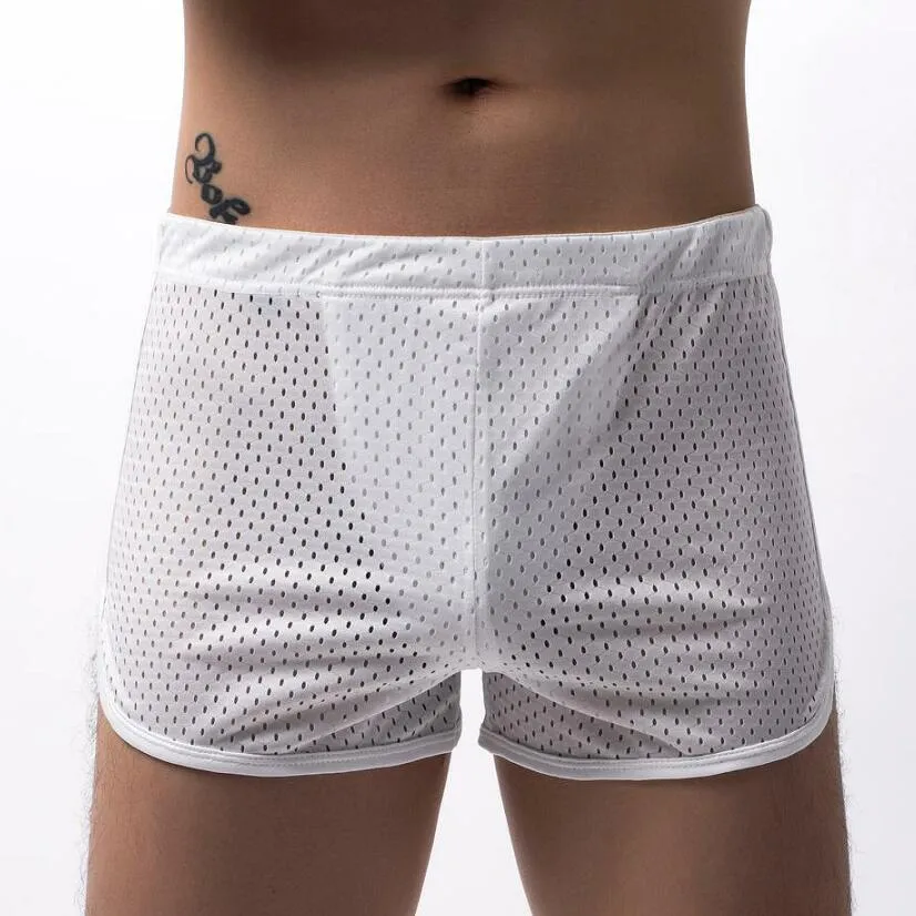 Men's black cotton blend boxer shorts with a mid-waist waistband laid flat.
