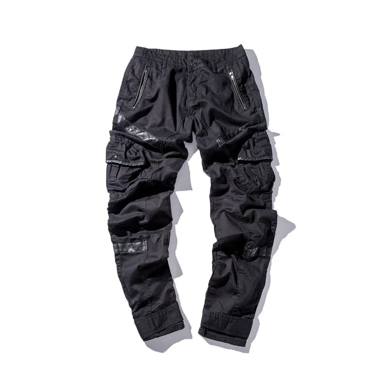 Black men's leather pocket splice cargo trousers with harem cut and long legs