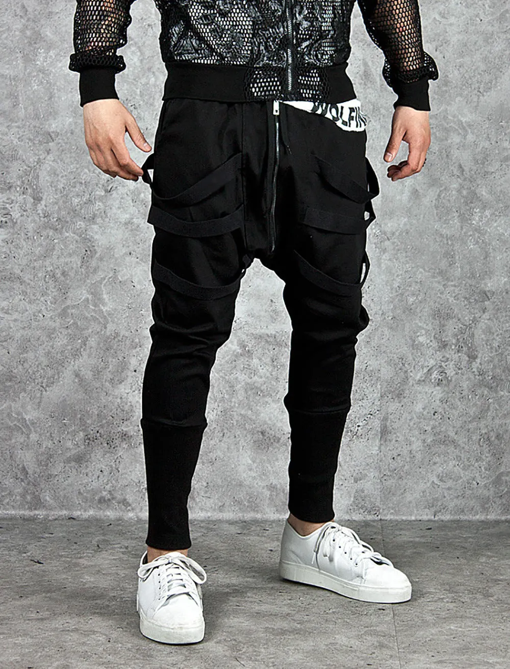 Low crotch cross pants for men in black with tapered leg and small foot opening