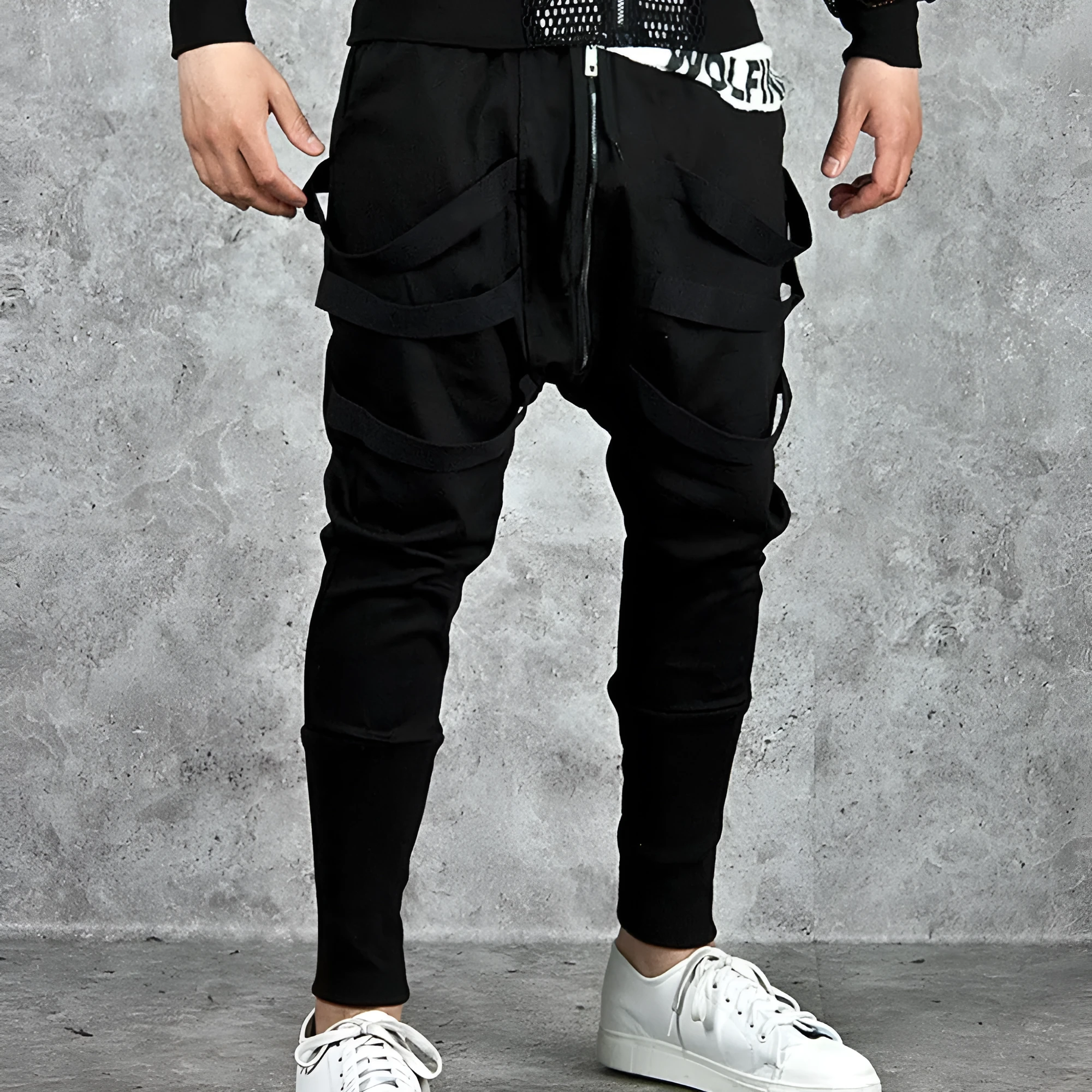 Low crotch cross pants for men in black with tapered leg and small foot opening