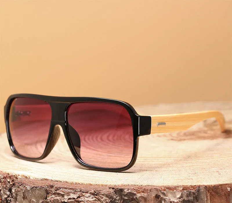 Wooden square sunglasses with brown frame and PC lenses on a flat surface