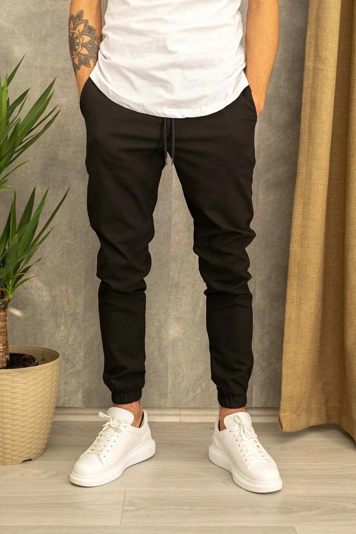 Men's casual plain cotton trousers with belt, tight-fitting pencil pants style, available in black grey khaki