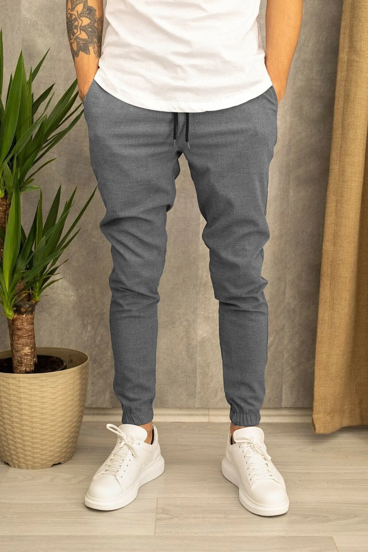Men's casual plain cotton trousers with belt, tight-fitting pencil pants style, available in black grey khaki