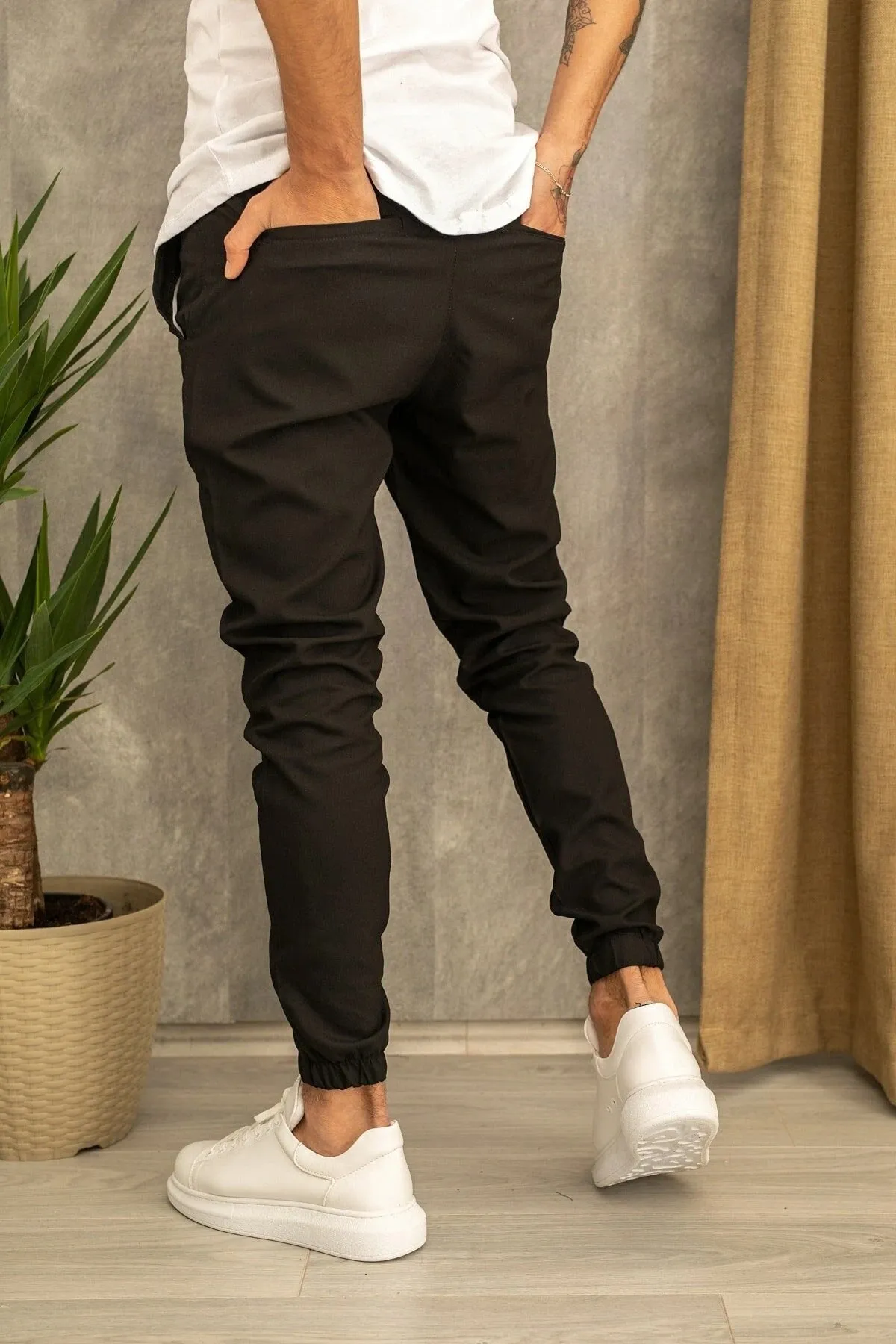 Men's casual plain cotton trousers with belt, tight-fitting pencil pants style, available in black grey khaki