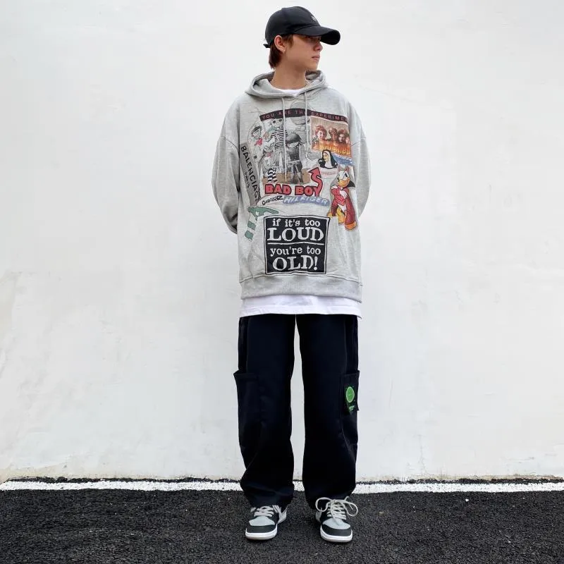 White hip hop hoodie with cartoon print, loose fit, plus velvet lining, and hood, side view